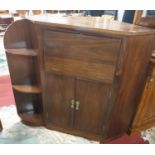 A 20th Century Mahogany Corner Cabinet.