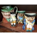 A Beswick Toby Jug 'Tony Weller' along with a Royal Doulton 'Happy John' toby and two others.