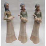 A quantity of Lladro style Figures.