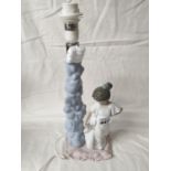 A Lladro Figural Table Lamp.