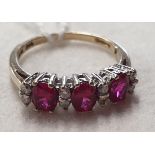 A 9ct Gold, Diamond and Ruby cluster Ring.