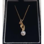 A 9ct gold and pearl Pendant and chain.