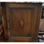 A 19th Century Oak wall mounted Corner Cabinet.