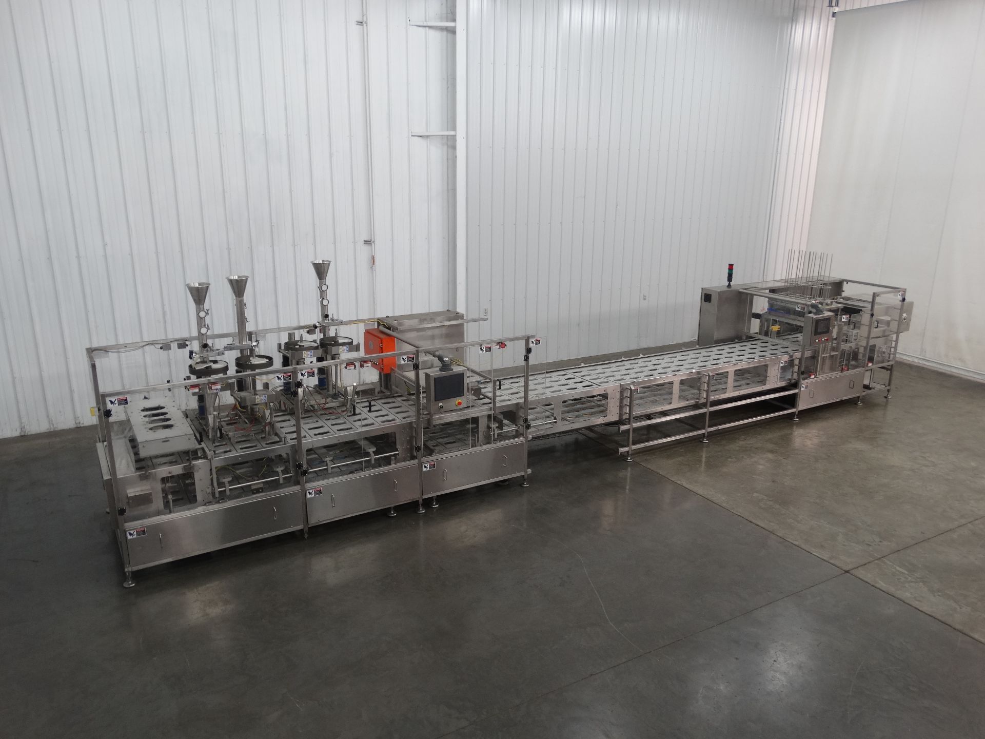 Orics S-30-DX Intermittent Inline Packaging System D1345