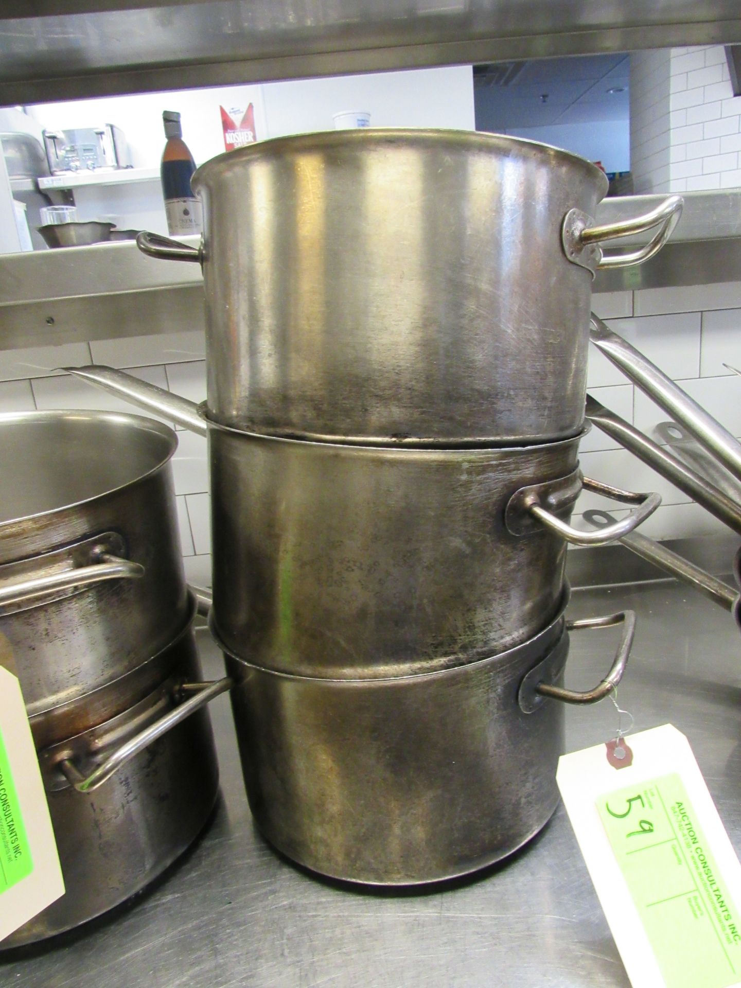 Three stock pots