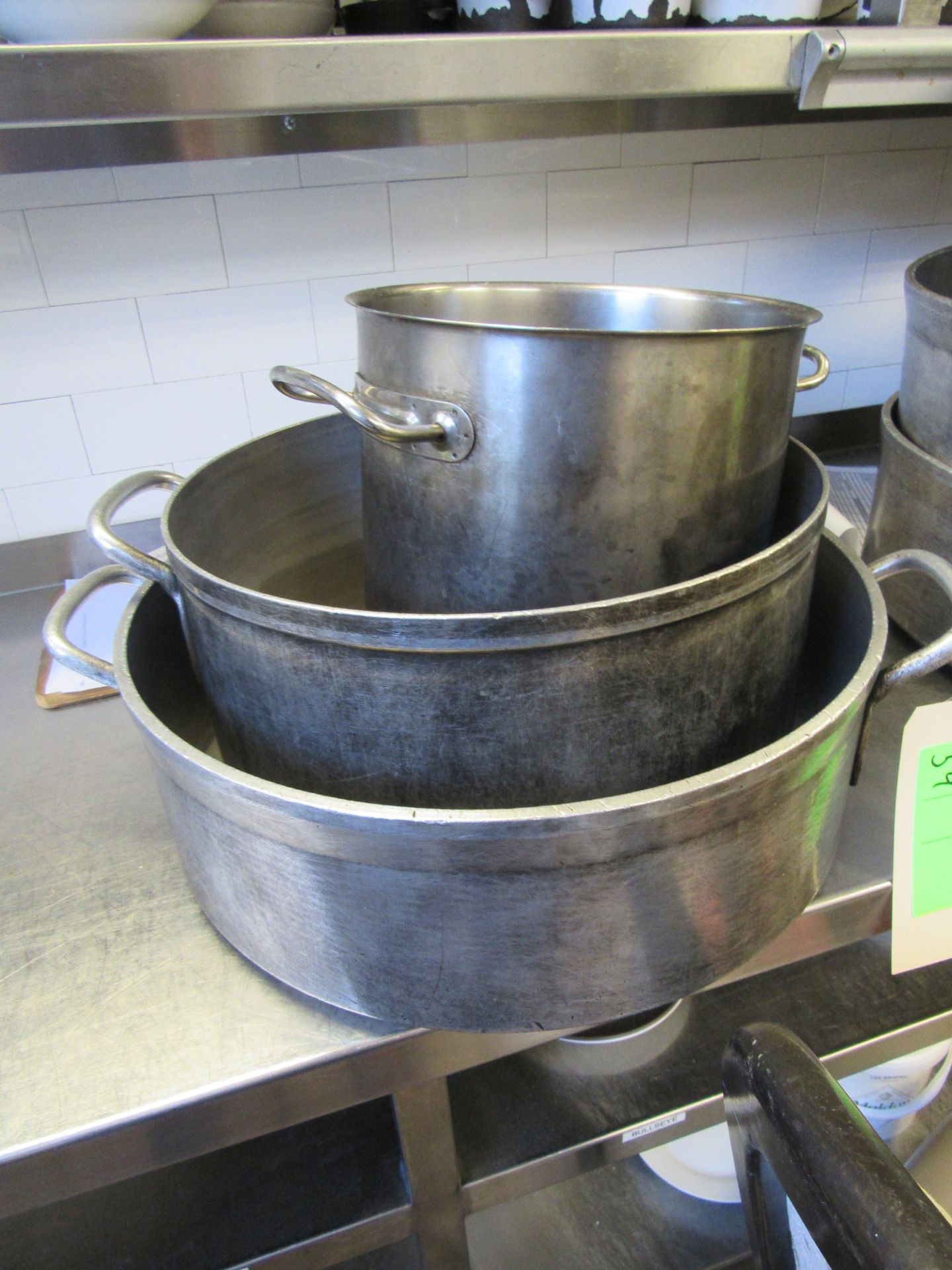 Three stock pots