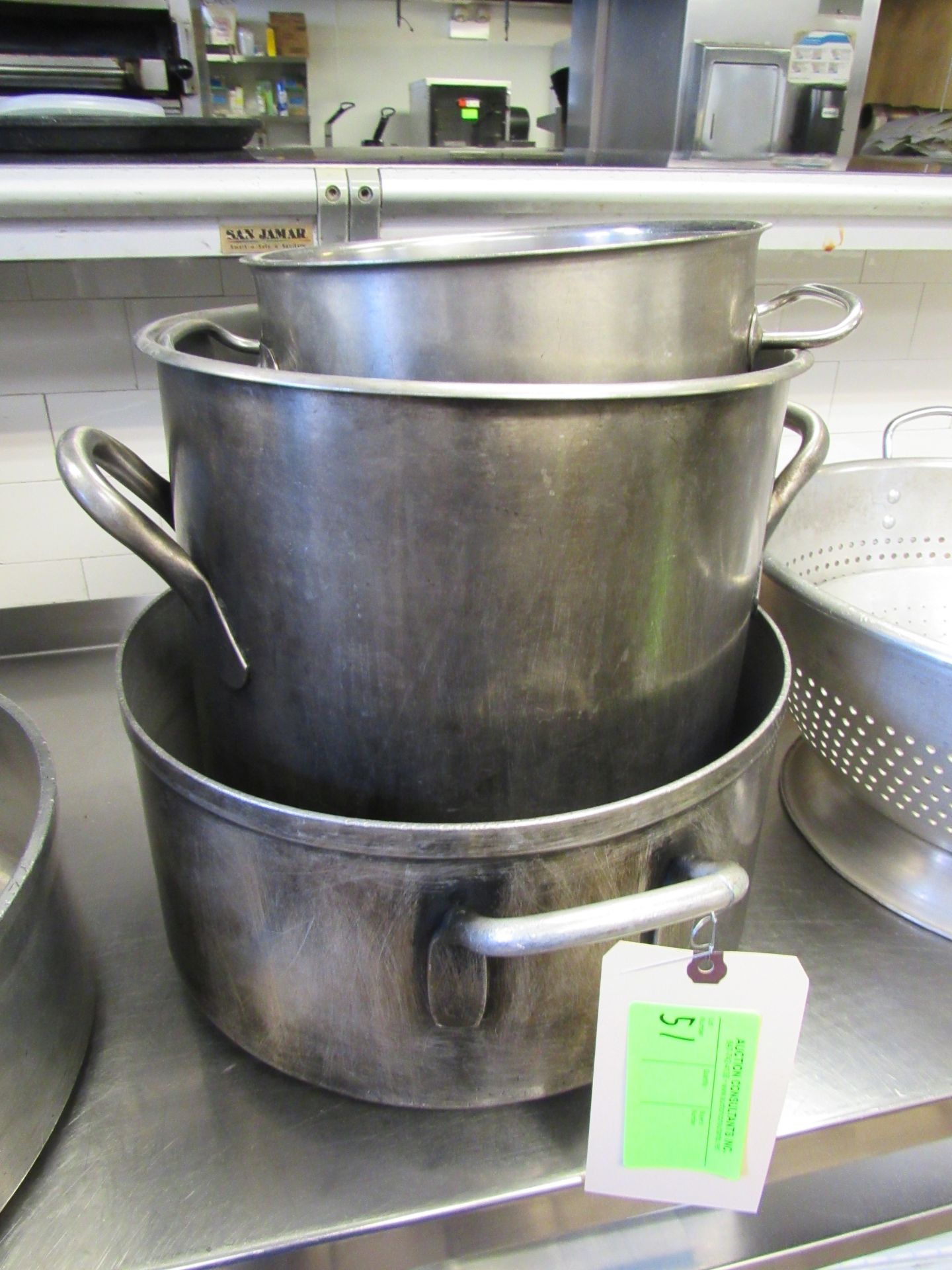 Three stock pots