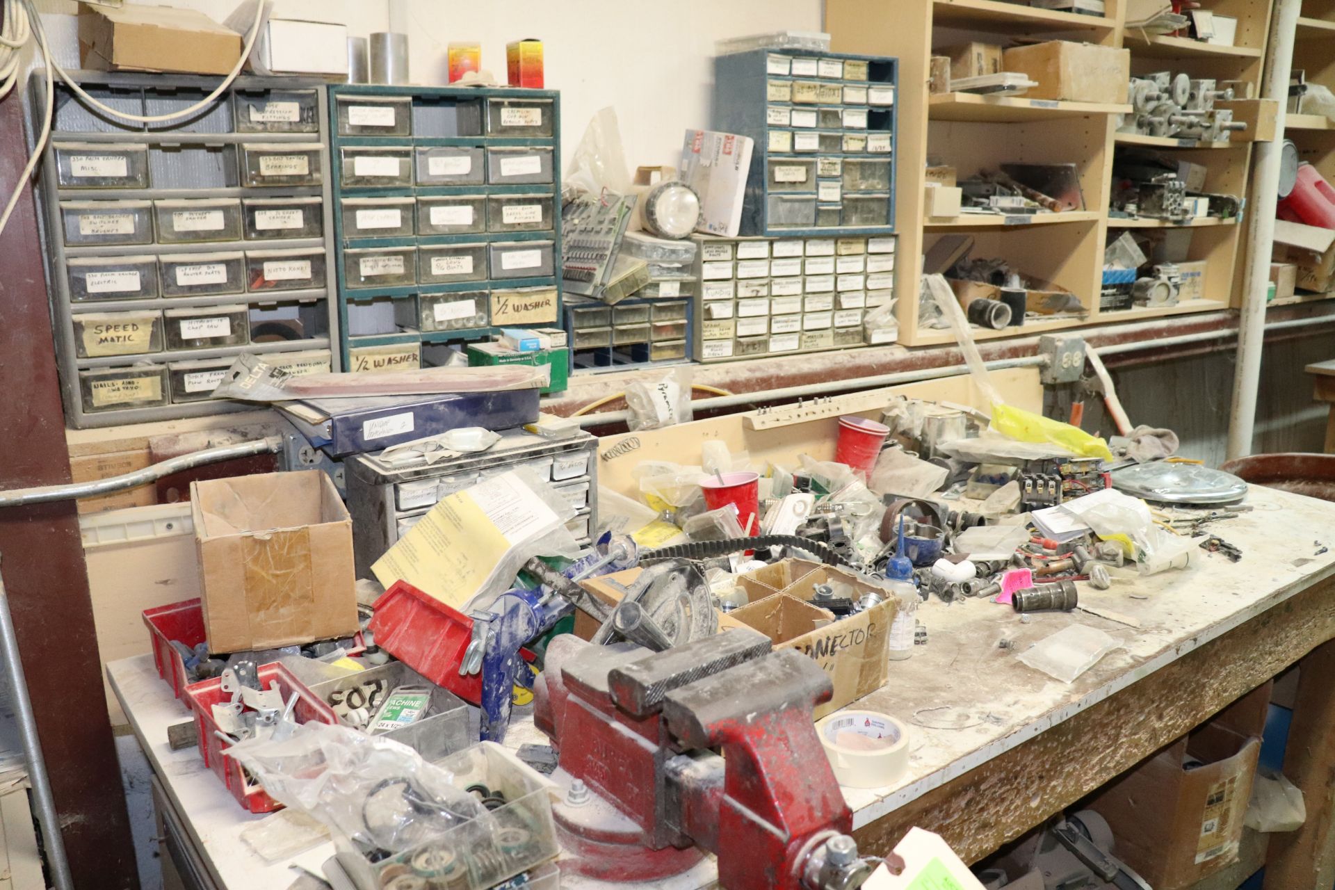 Workbench and contents with fasteners, everything included on back wall