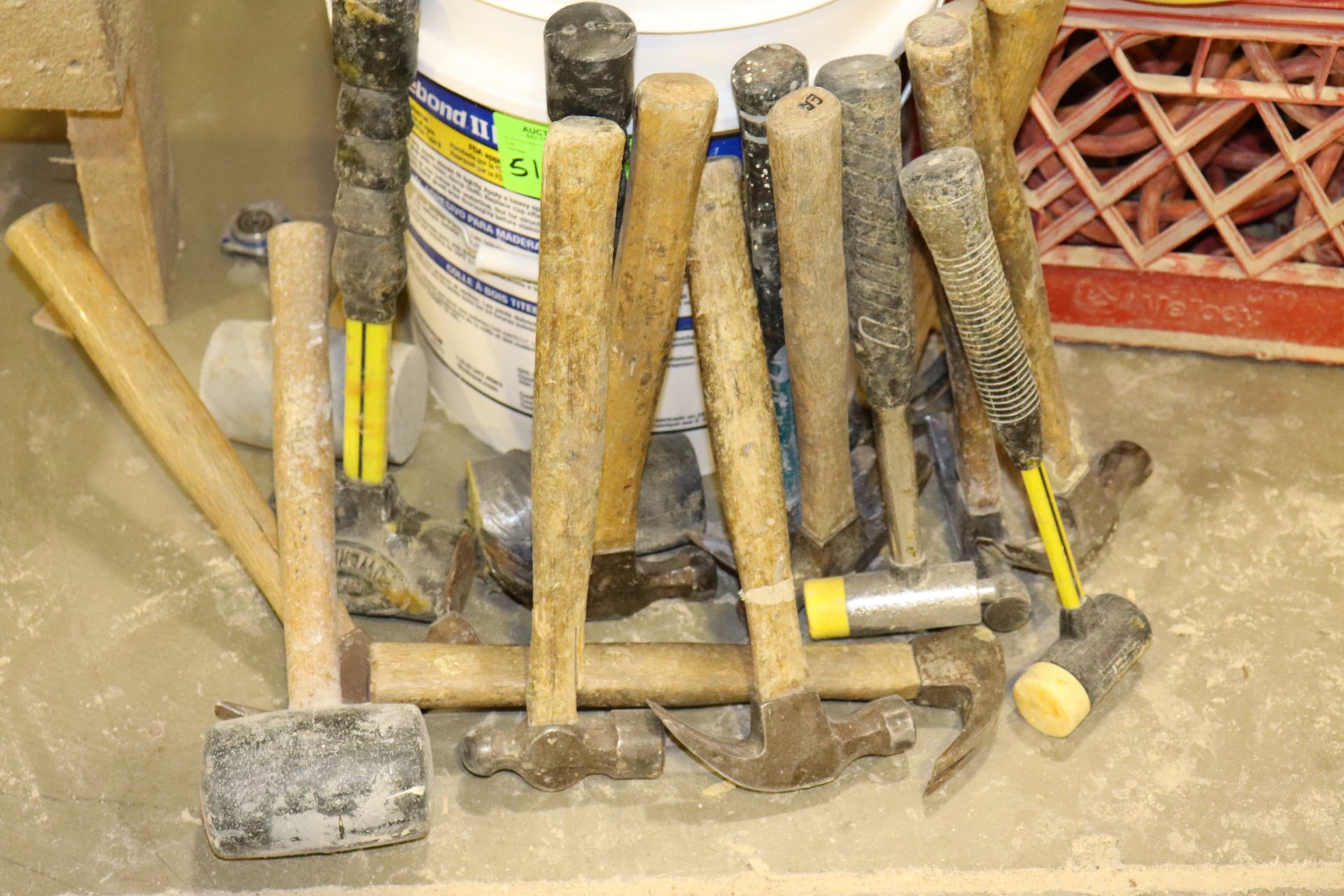 Miscellaneous mallets and hammer in barrel