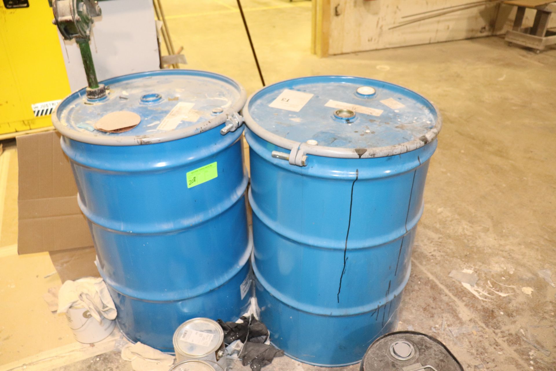 Two 55-gallon drums of WB stain base and 1 barrel of Aqualux Satin 2, sealed