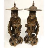 Two Wooden Carved Oriental Figurines