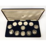 H.M. QUEEN ELIZABETH THE QUEEN MOTHER TWELVE STERLING SILVER MEDALS SET