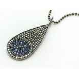 14 CARAT GOLD DIAMOND AND BLUE SAPPHIRE PENDANT AND CHAIN