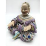 ORIENTAL PORCELAIN ARTICULATED NODDING HEAD PAGODA FIGURE