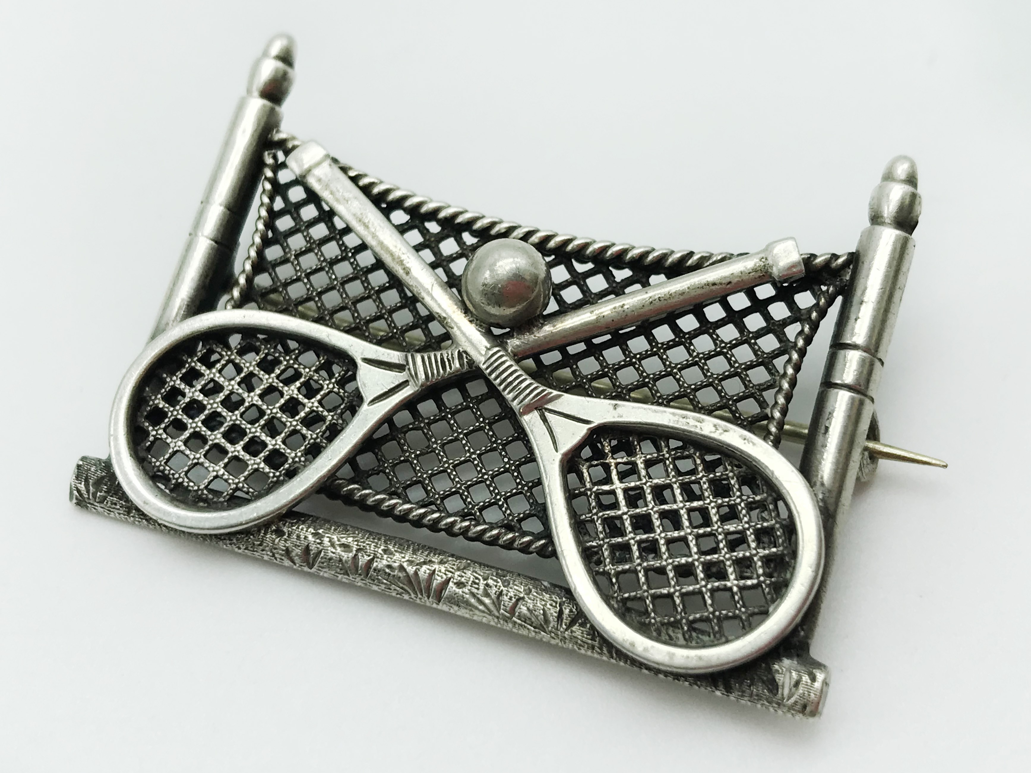 HALLMARKED SILVER TENNIS BROOCH