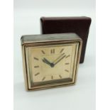 A VINTAGE SILVER GILT BOUCHERON PARIS TRAVEL ALARM CLOCK IN WORKING CONDITION