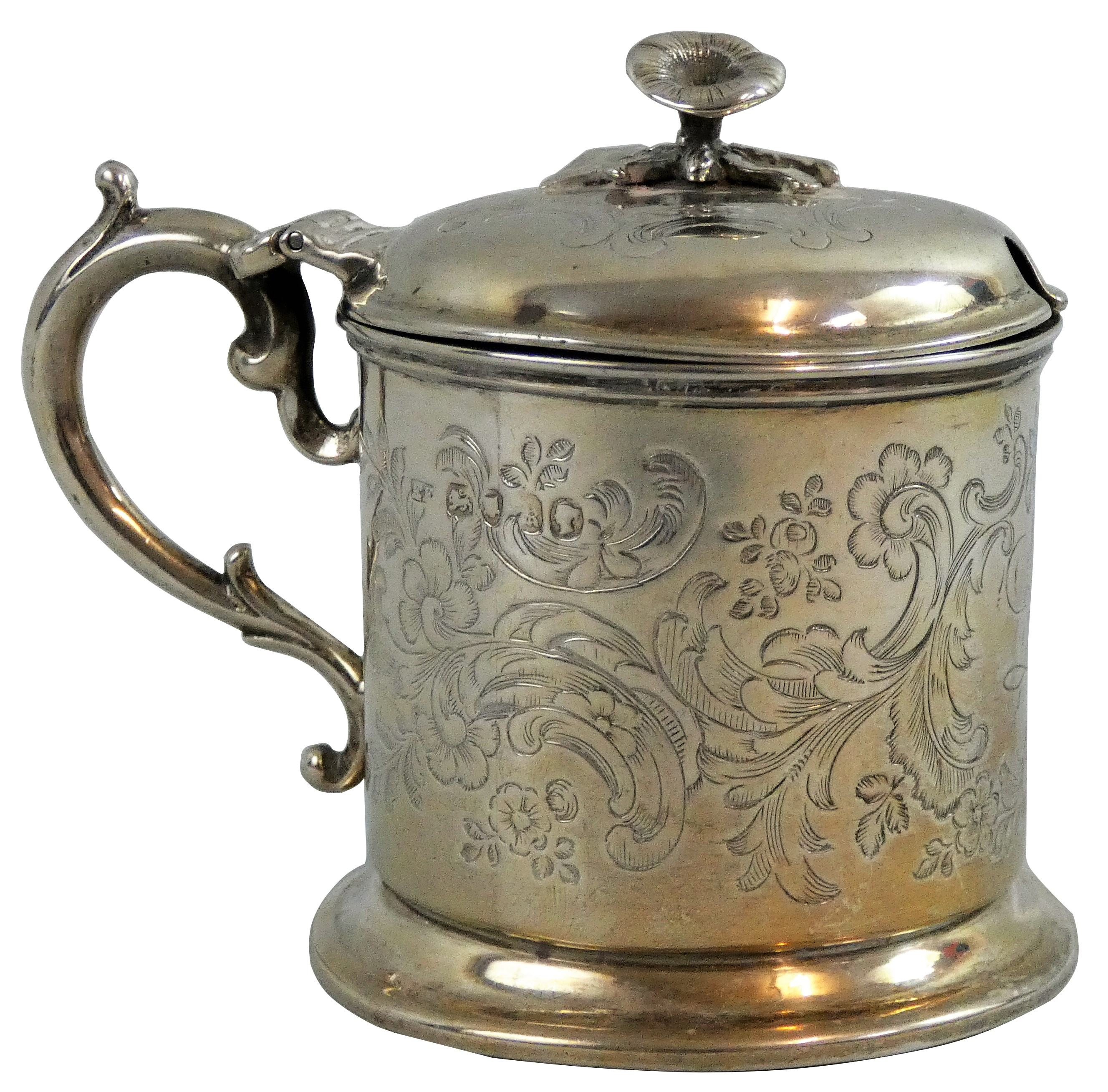 A Victorian silver mustard pot, London 1865, with floral engraved decoration, floral finial, no