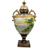 A large Noritaki two-handled vase of bulbous form, the cover with painted roses and gilt finial,