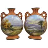 A Victorian pair of Prattware vases, of flask form, decorated with rural scenes, height 25 cm.