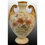 A Royal Worcester blush ivory two-handled vase, floral decoration on apricot ground, gilt