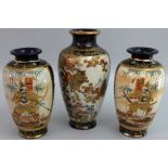 A pair of Japanese Satsuma vases of slender ovoid form, depicting samurais in tones of blue and