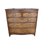 A 19th century mahogany chest of drawers, the frieze with boxwood inlay, composed of two short