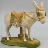 A Royal Dux porcelain model of a donkey, in typical colours and with peach triangle mark for circa