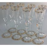 Moser - a set of eight early 20th century clear crystal champagne flutes with circular spread