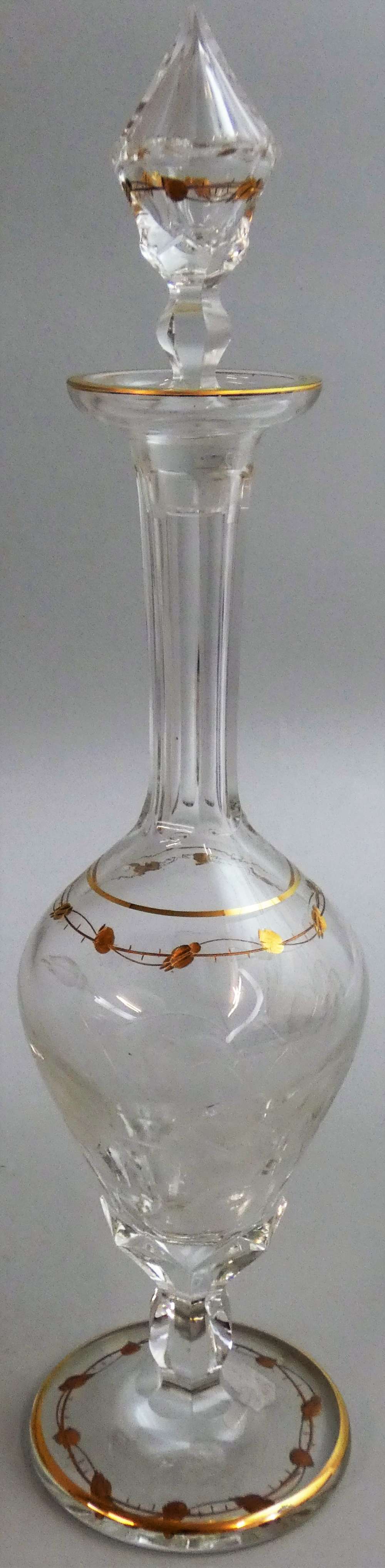 Moser - an early 20th century clear crystal wine carafe with circular spread foot, facet cut stem,