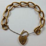 An Edwardian 9ct rose gold hollow curb link bracelet, Birmingham 1908, weight 13.5 gms.