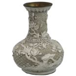 A Chinese carved ivory white lacquer vase with slender neck and bulbous body, the relief pattern