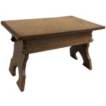 Jack Crimble, Cromer - an adzed oak stool, with rectangular top, the legs with arched supports,