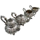 A William IV silver four piece tea and coffee service, by W.H, not traced, London 1836, of melon
