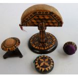 A Victorian Tunbridge ware fan-shaped pin cushion, baluster stem, together with a circular disc