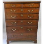 A 19th century oak chest of drawers, composed of two short over five long drawers, raised on bracket