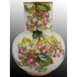 A Royal Worcester blush ivory squat vase, floral decoration on apricot ground, gilt rims, green date