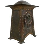 An Arts & Crafts copper mantle clock, circa 1905, unsigned, the dial with Roman numerals, the