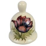 A Moorcroft Annual Year 1985 bell, 'Clematis' on cream ground, No. 71/1000, height 12.5 cm, diameter