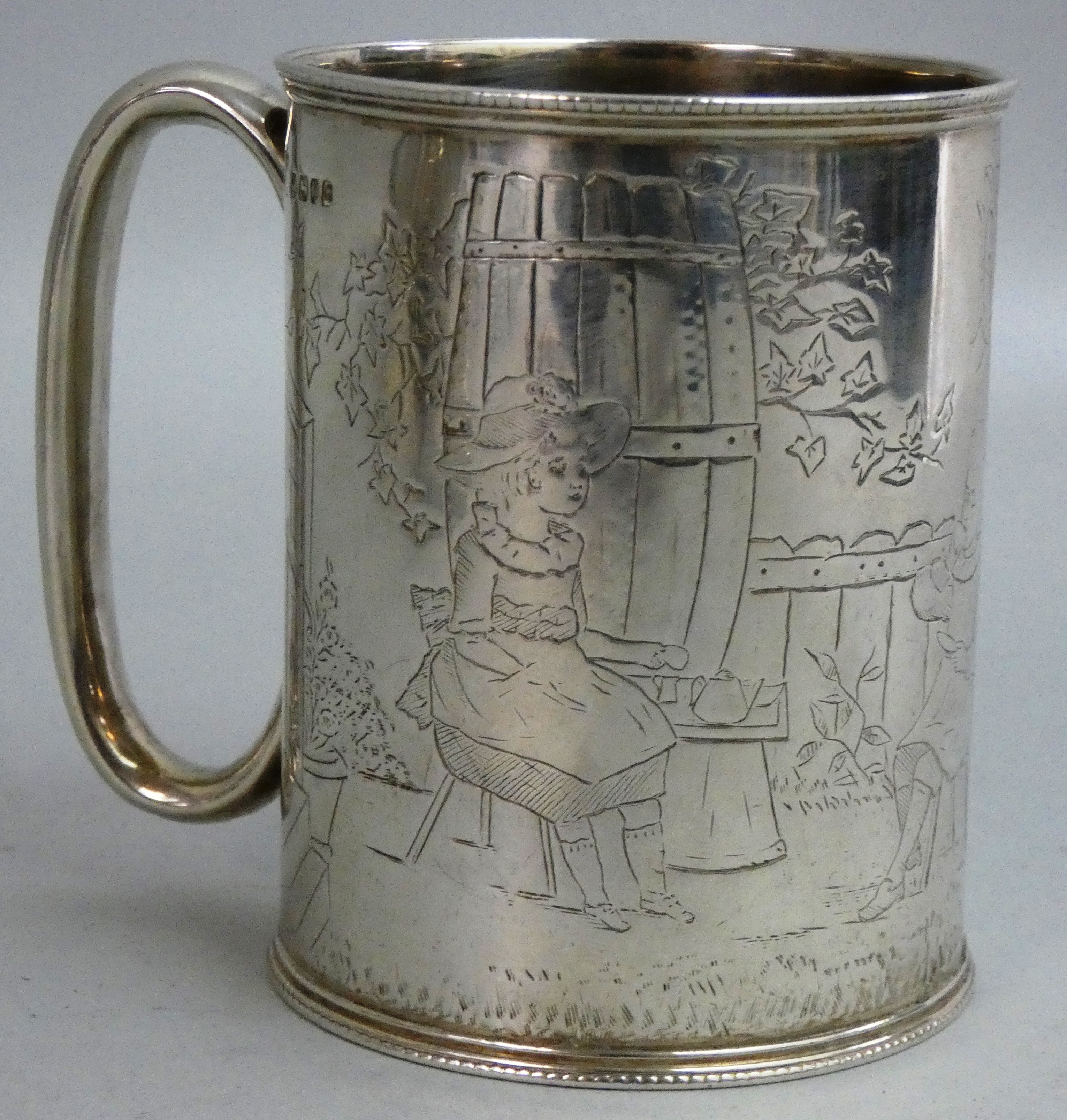 A Victorian silver novelty christening mug, by CB over ?P, Sheffield 1887, engraved after a Kate