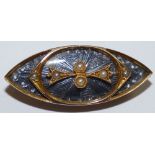 An Edwardian gold, half pearl and enamel brooch, of lozenge shape, the steel blue guioche enamel