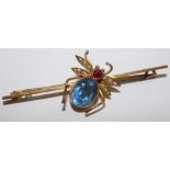 A 9ct gold bug brooch, the milligrain collet set blue paste thorax with red paste head, half pearl
