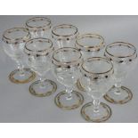 Moser - a set of eight early 20th century clear crystal wine glasses with circular spread foot,