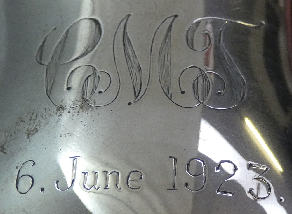 A silver christening mug, Birmingham, date letter worn, of baluster form, monogrammed and dated - Image 2 of 2