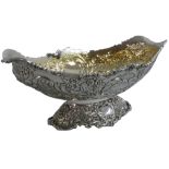 A Victorian silver bowl, by Gibson & Langman, London 1899, the floral embossed bowl over a similar