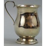 A silver christening mug, Birmingham, date letter worn, of baluster form, monogrammed and dated