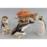 A Royal Crown Derby group of four English Bone China paperweights, 'Penguin', No. XLIX, silver