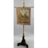 A Victorian mahogany and brass pole screen, the textured pole supporting a machine made trapestry,