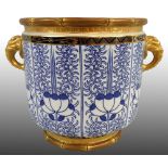 A Royal Worcester two-handled jardinière, blue and white pattern with gilt edges and handles, the