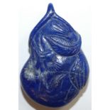 A Chinese carved lapis lazuli matrix pendant, in the form of a gourd, length 40 mm.