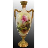 A Royal Worcester blush ivory two-handled vase, of slender ovoid form with painted pink rose